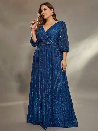 Woman wearing a blue sequin dress against a neutral background